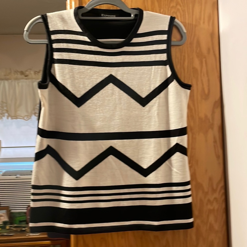 Knit sleeveless top. Size M. Never worn. NWOT